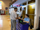 Астраханцы смогли узнать о своих долгах в мобильных пунктах на вокзалах и аэропорту